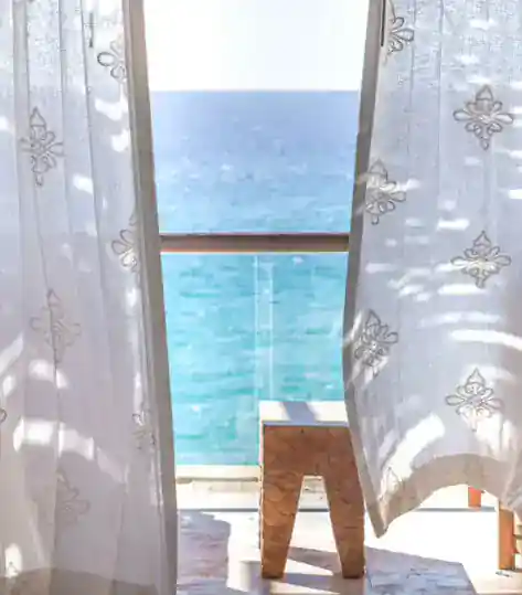 Window with ocean view from a villa